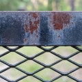 Choosing the Right Stain for Your Metal Fence