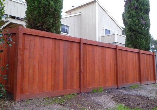 Applying Stain to a Fence